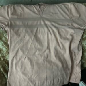 Light pink Nike dri-fit golf polo
